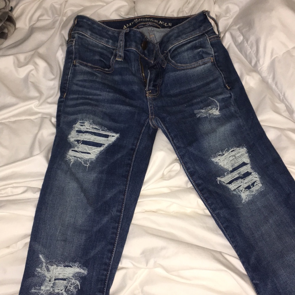 NWOT medium wash patch skinny jeans